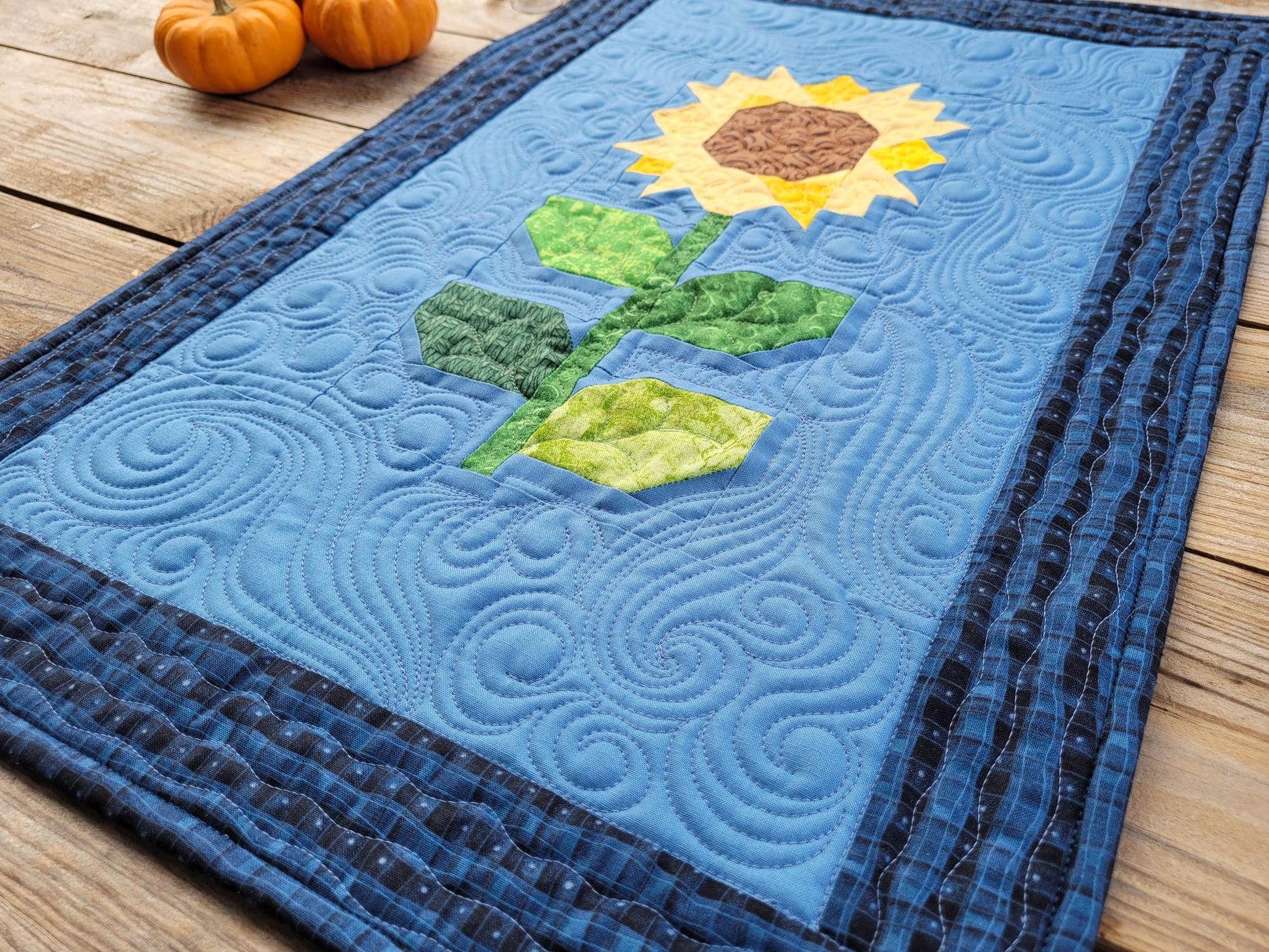 Angle view of sunflower quilt