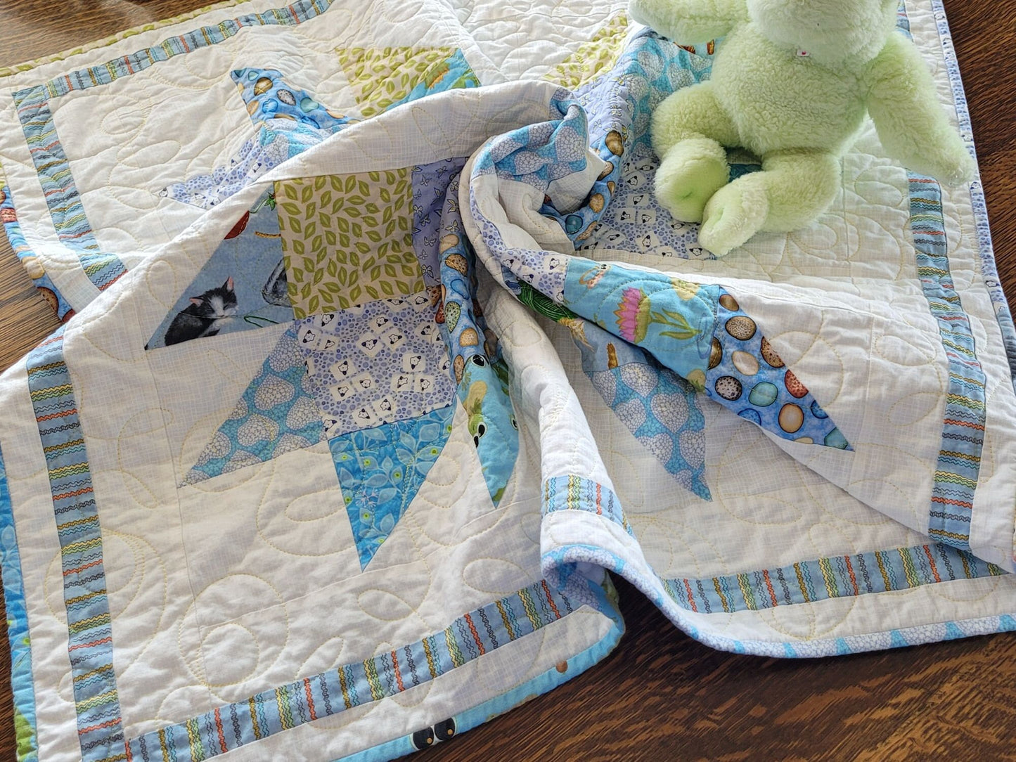 white version of baby quilt sold separately