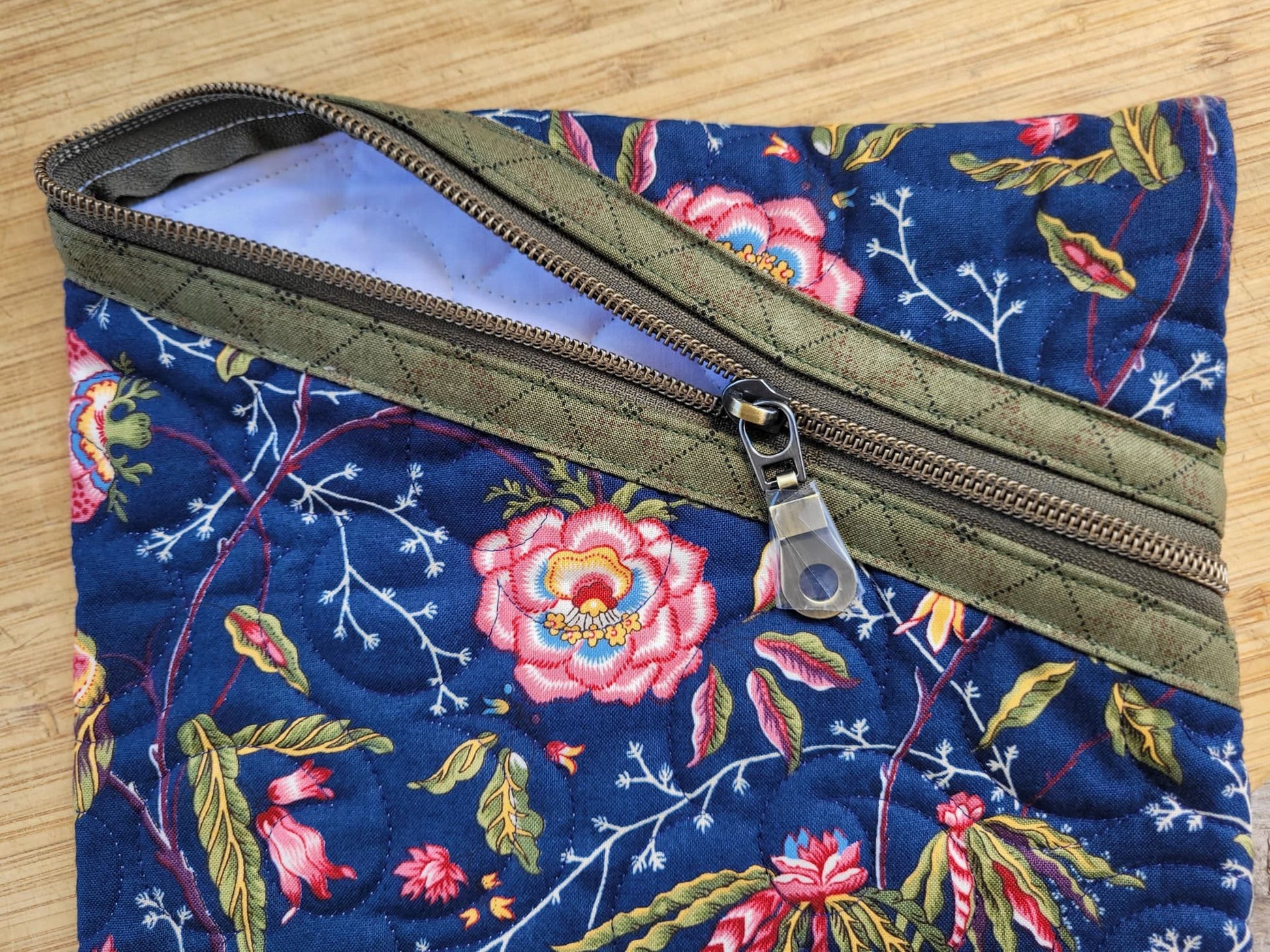 Navy and Green zipper pouch showing zipper detail