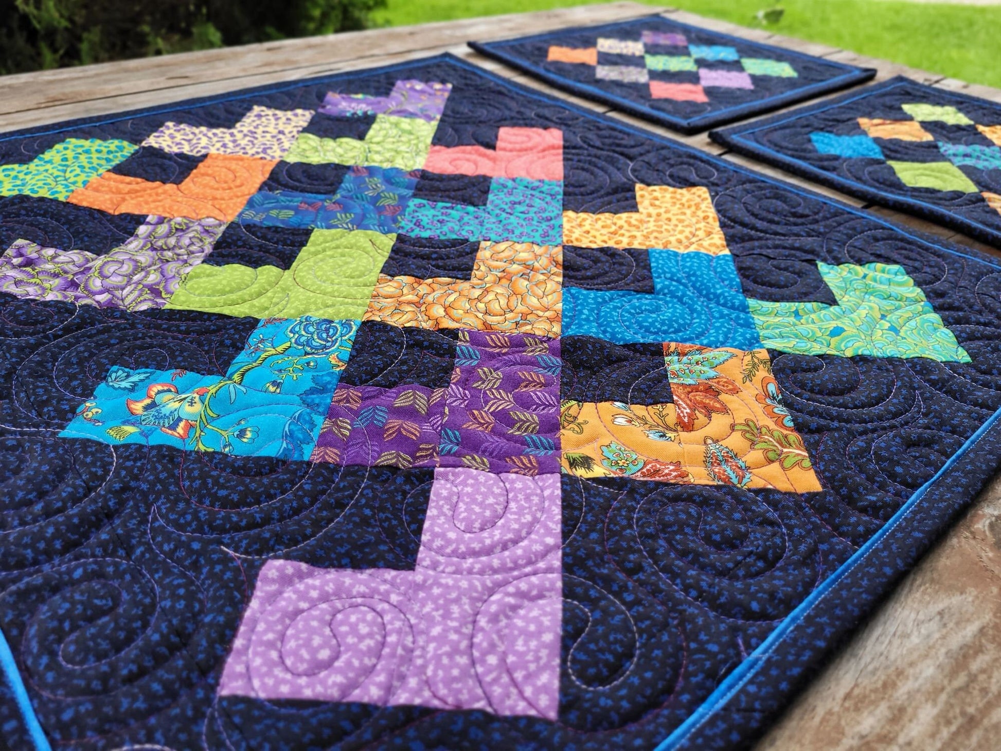 Bright Wall Quilt with Matching Table Toppers with Patchwork Hearts