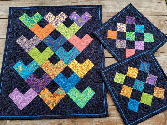 Bright Wall Quilt with Matching Table Toppers with Patchwork Hearts