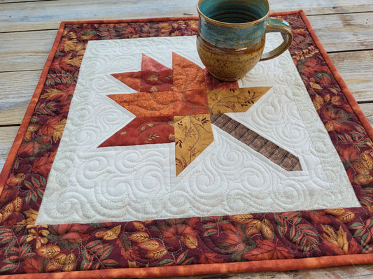 quilted table runner with fall leaf