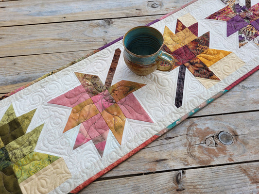 quilted table runner with fall leaves