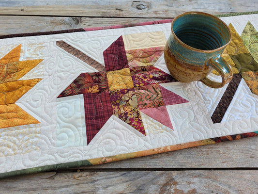 quilted table runner with fall leaves