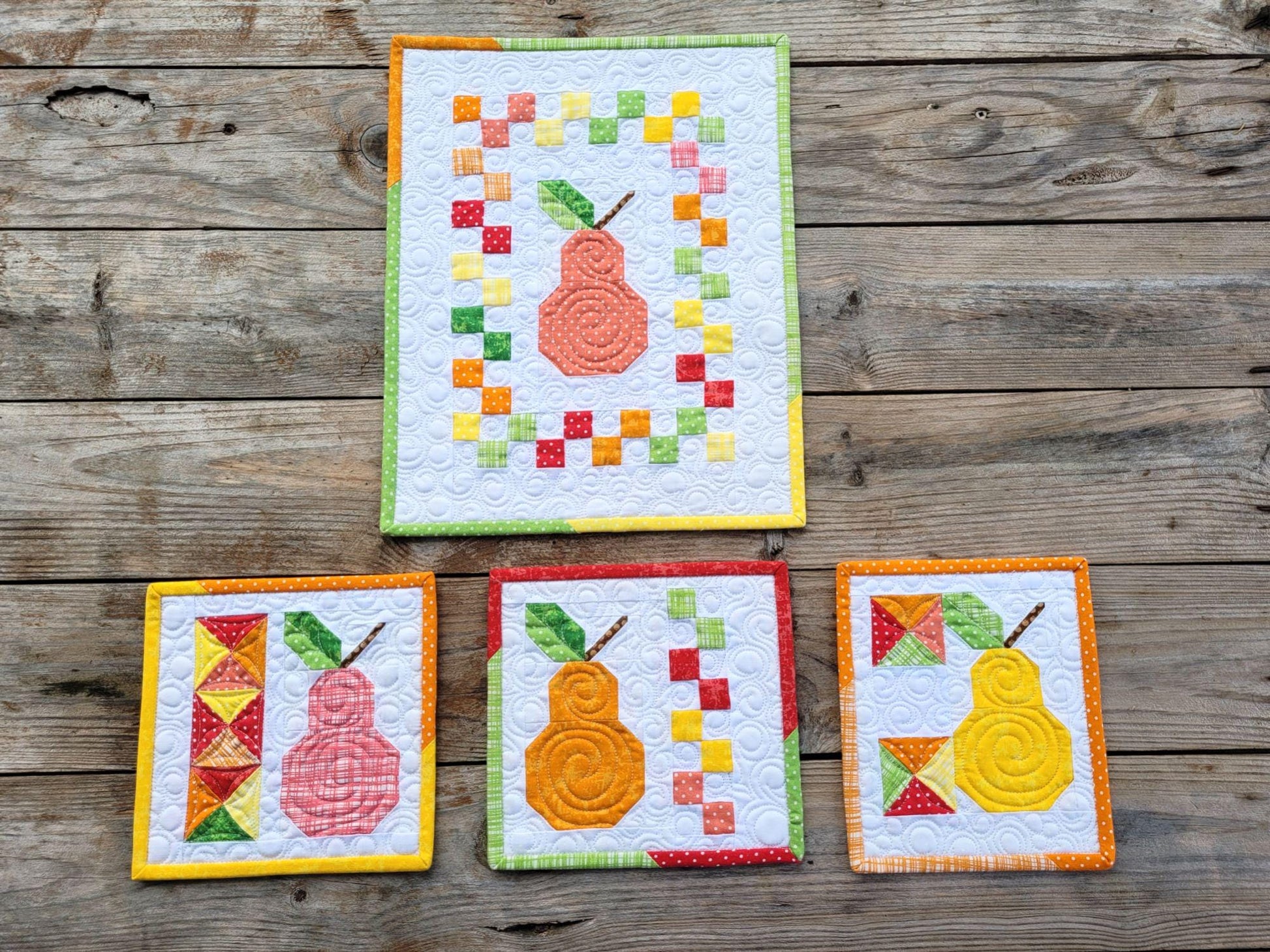 mini wall quilts in colorful scrappy patchwork pear fruit