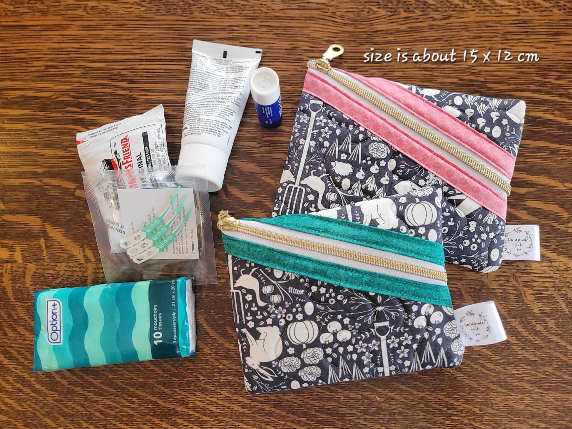 small size quilted zipper pouches with pink or green zipper option. Shown with suggested use items like purse size tissues, mini lotion tube, lip balm, tooth picks, cough drops, etc.