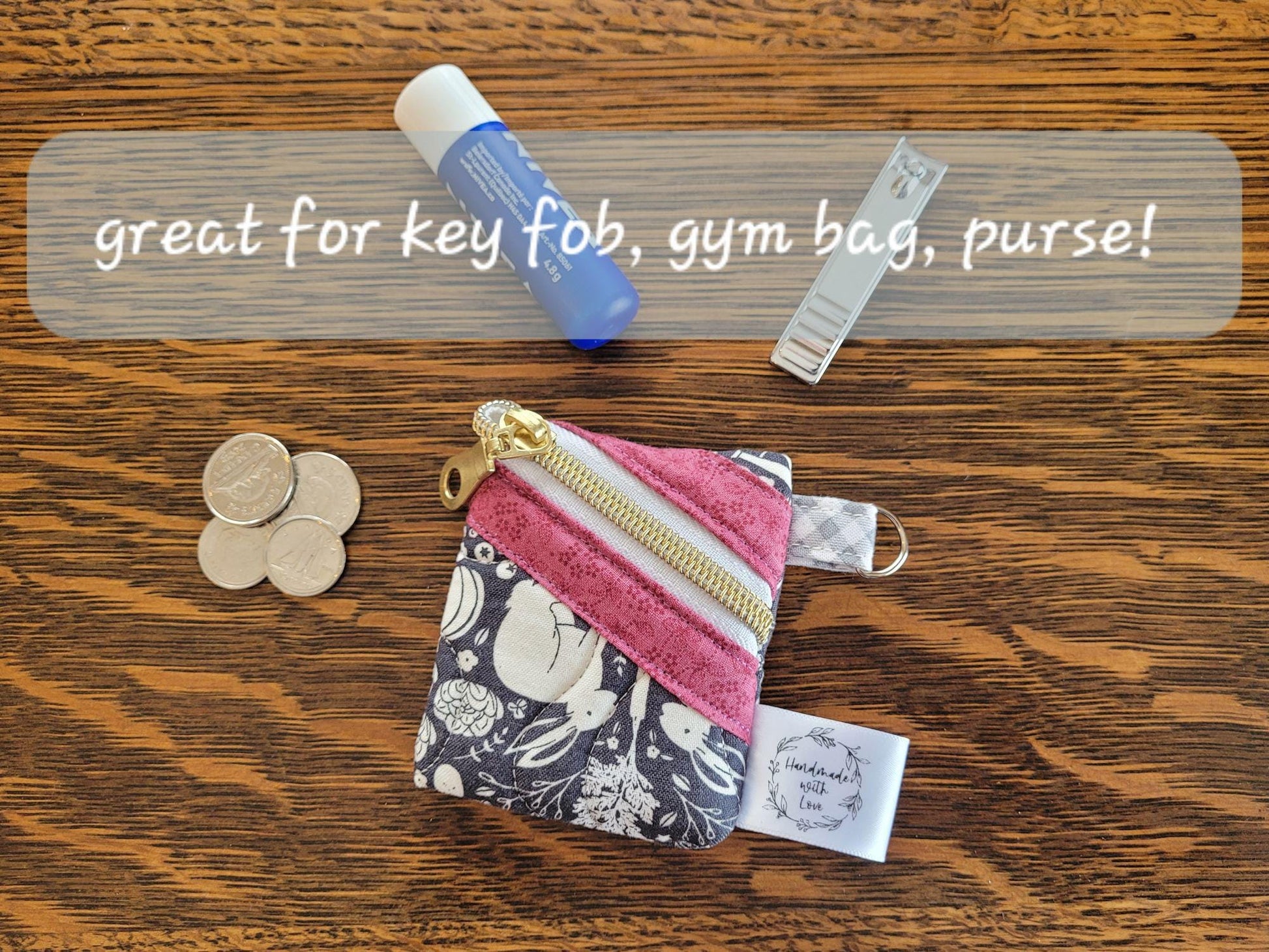 Small keychain zipper pouch shown with suggested items you might put in it, coins, lip balm, nail clippers, etc.